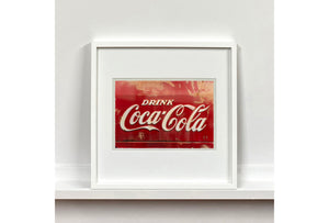 This artwork is one of Richard's many iconic Coca-Cola sign artworks. This one was captured in the So-Cal Speed Shop in Phoenix, Arizona, and has an interesting raw distressed quality. The classic Coca-Cola red, combined with the texture and relief text really make this piece pop.