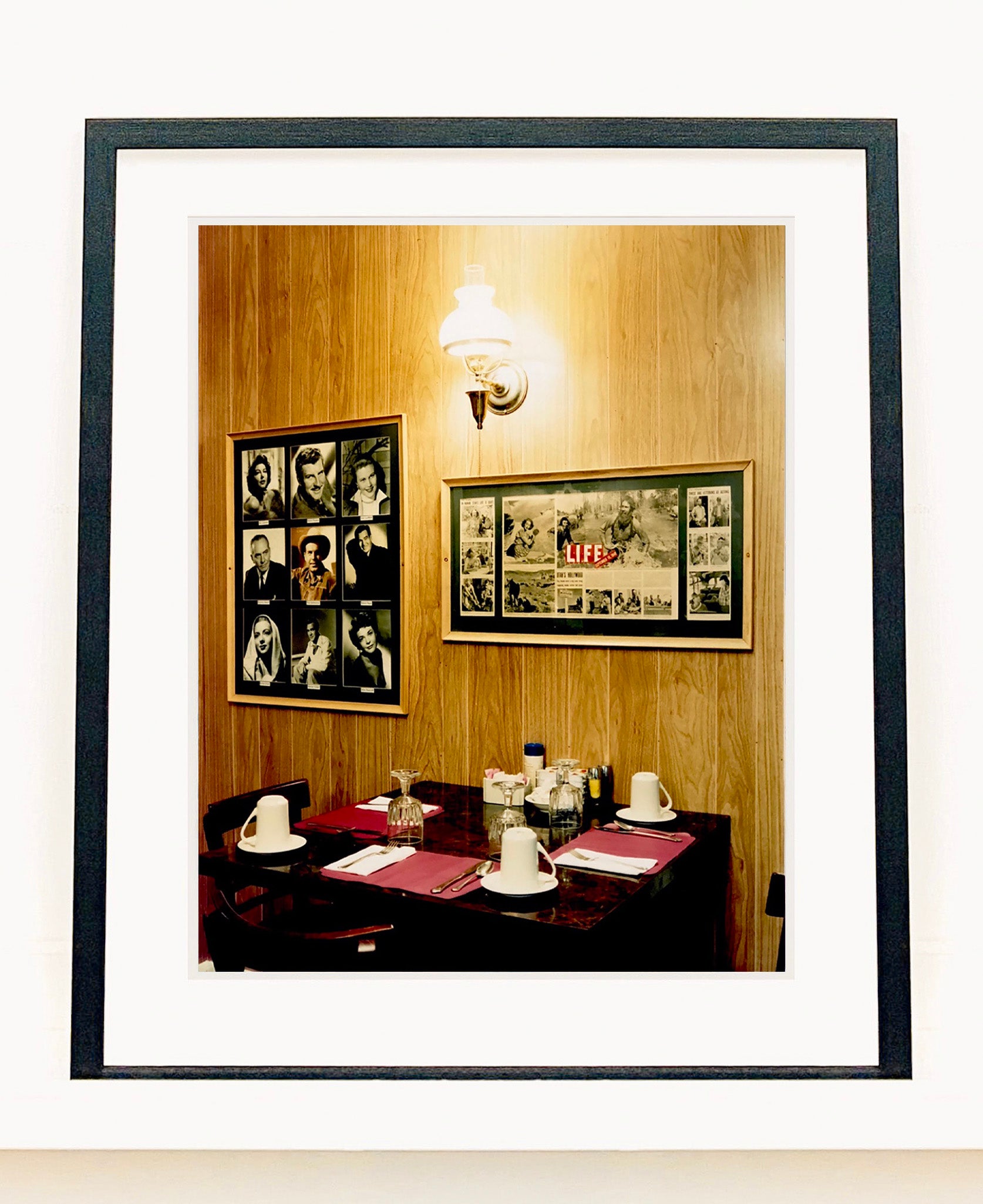 Photographed inside the iconic Parry Lodge that once hosted movie stars of the Western films made in the area, now the walls adorn their faces in cutouts from Life Magazine. The vintage interior and wood panelled walls create a mid-century cinematic scene. Part of Richard Heeps' Dream in Colour series.