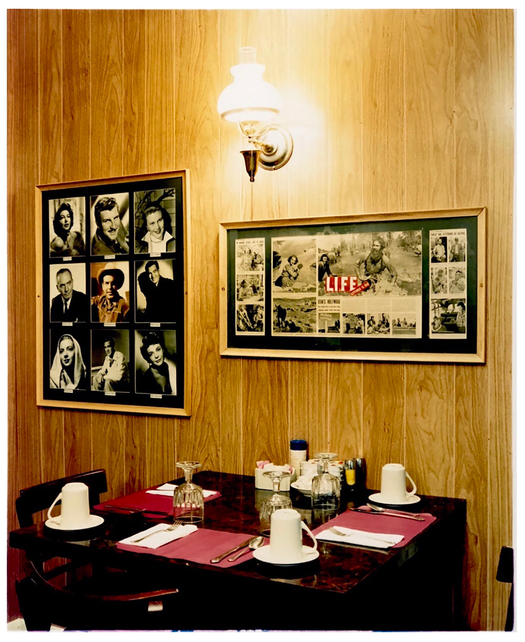 Photographed inside the iconic Parry Lodge that once hosted movie stars of the Western films made in the area, now the walls adorn their faces in cutouts from Life Magazine. The vintage interior and wood panelled walls create a mid-century cinematic scene. Part of Richard Heeps' Dream in Colour series.