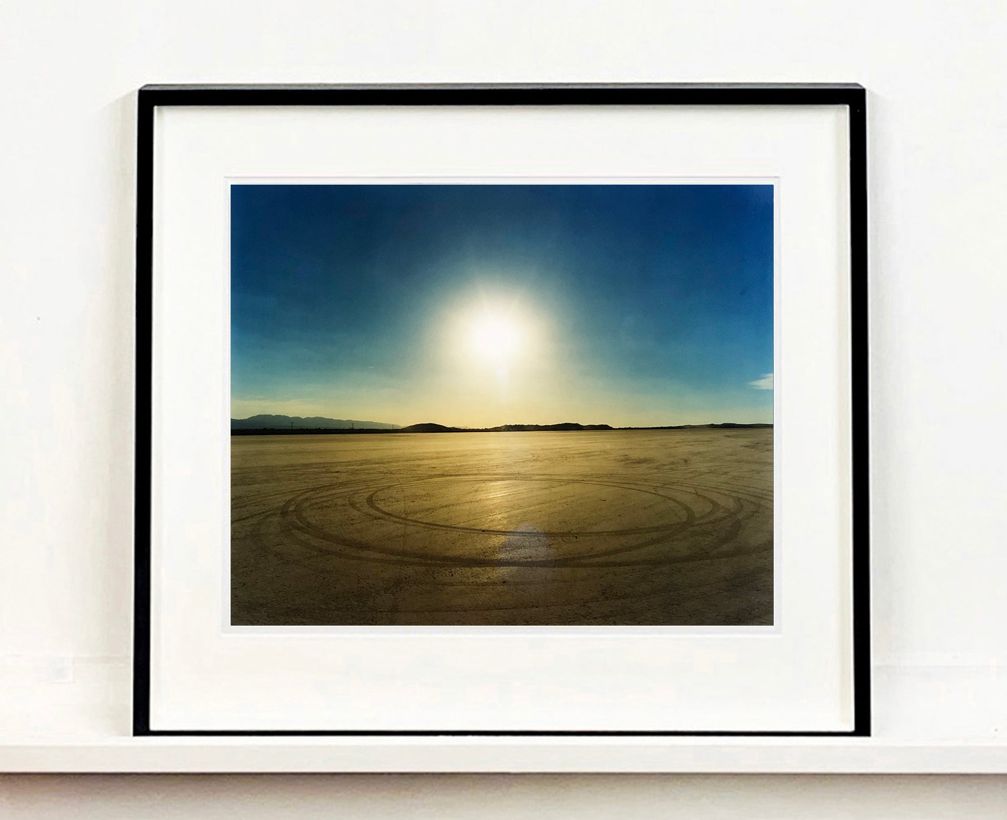 Photographed at El Mirage Lake, where the Southern Californian Timing Association, Land Speed Racing event, tracks in the ground from the previous days racing, adding a beauty to the natural landscape.