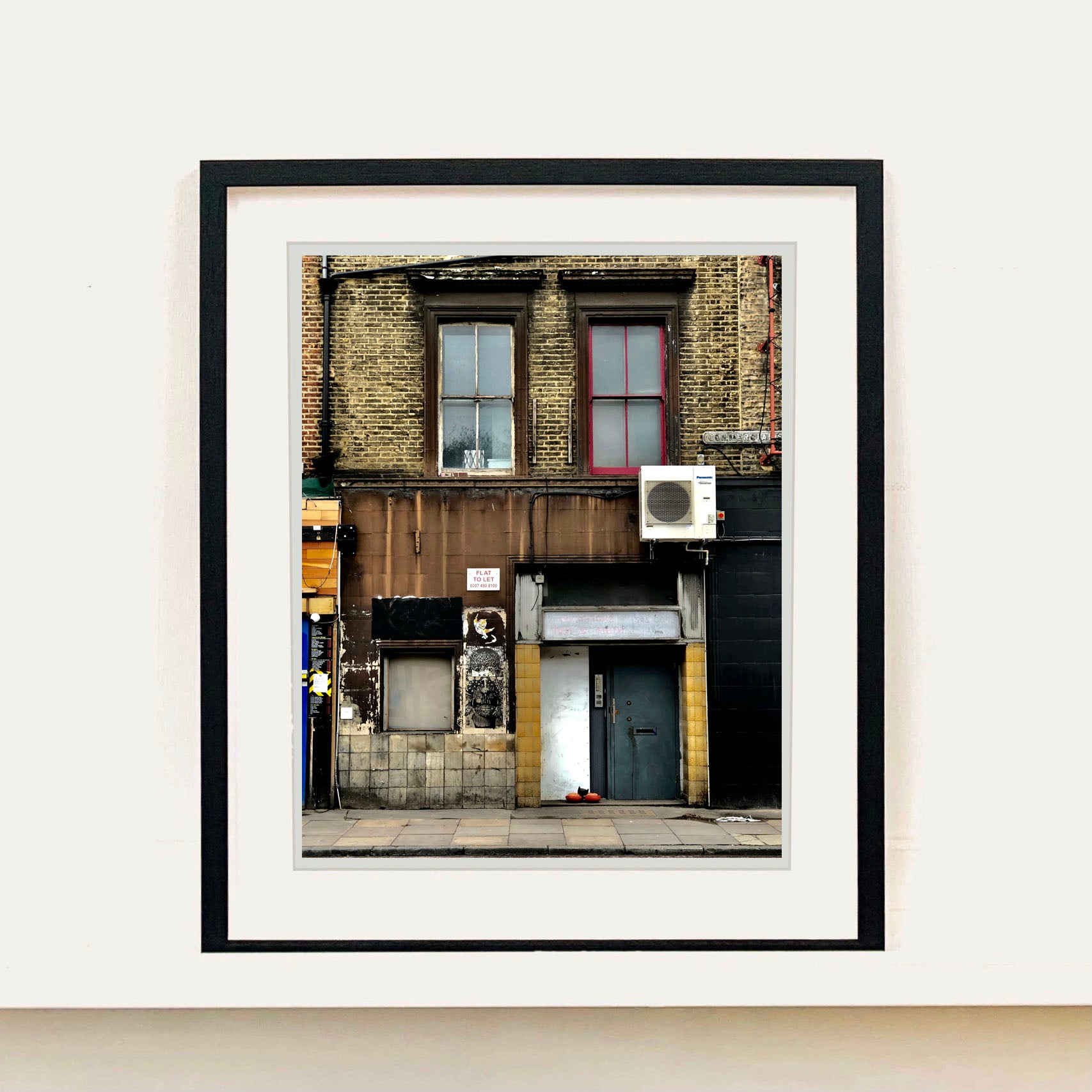 East London brick building architecture photograph by Richard Heeps framed in black