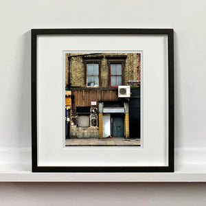 East London brick building architecture photograph by Richard Heeps framed in black