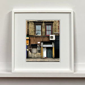 East London brick building architecture photograph by Richard Heeps framed in white