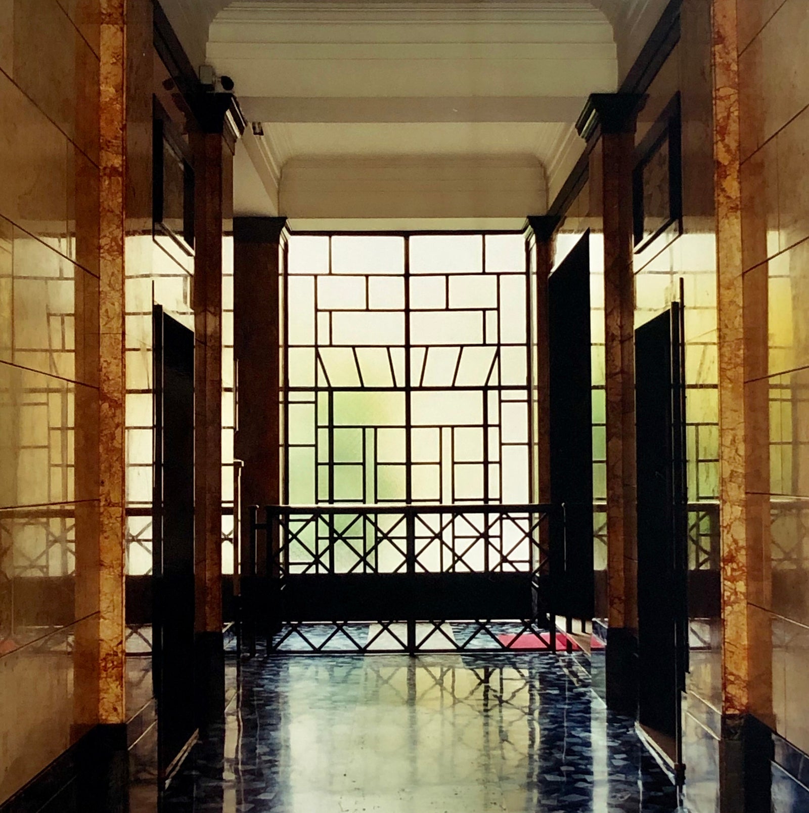 An art deco style, geometric patterned foyer, photographed by Richard Heeps in Milan. 