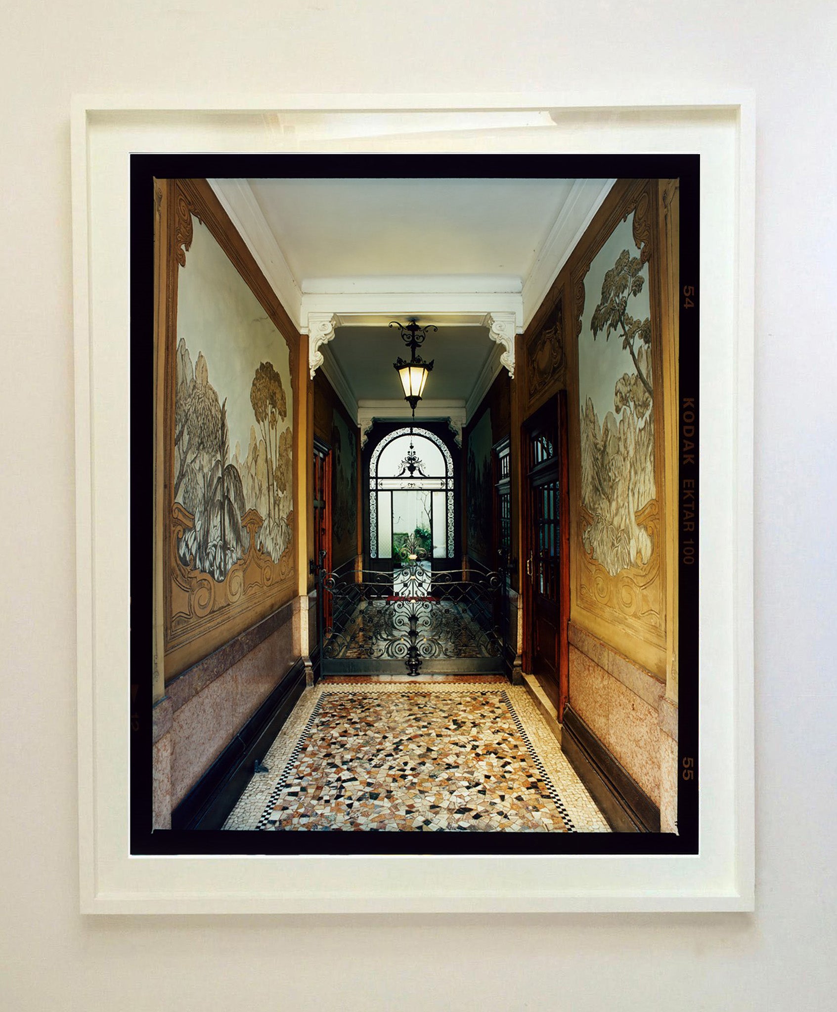 'Foyer VI' is an Art Deco entrance hall in Milan, featuring stained glass panelling and marble flooring. This piece is part of Richard Heeps' series 'A Short History of Milan' which began in November 2018 for a special project featuring at the Affordable Art Fair Milan 2019, and the series is ongoing. There is a reoccurring linear, structural theme throughout the series, capturing the Milanese use of materials in design such as glass, metal, wood and stone. 