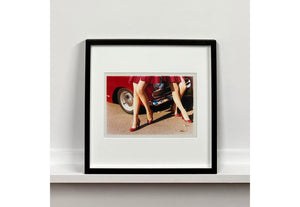 'Glamour Cabs', photographed by Richard Heeps at the glamorous retro event Goodwood Revival. It perfectly captures elegant feminine sophistication with a vintage vibe, a nod to the film Carry on Cabbie. This artwork featured in Richard Heeps' 2018-2019 exhibition WEMEN, at Nhow Hotel Milan.