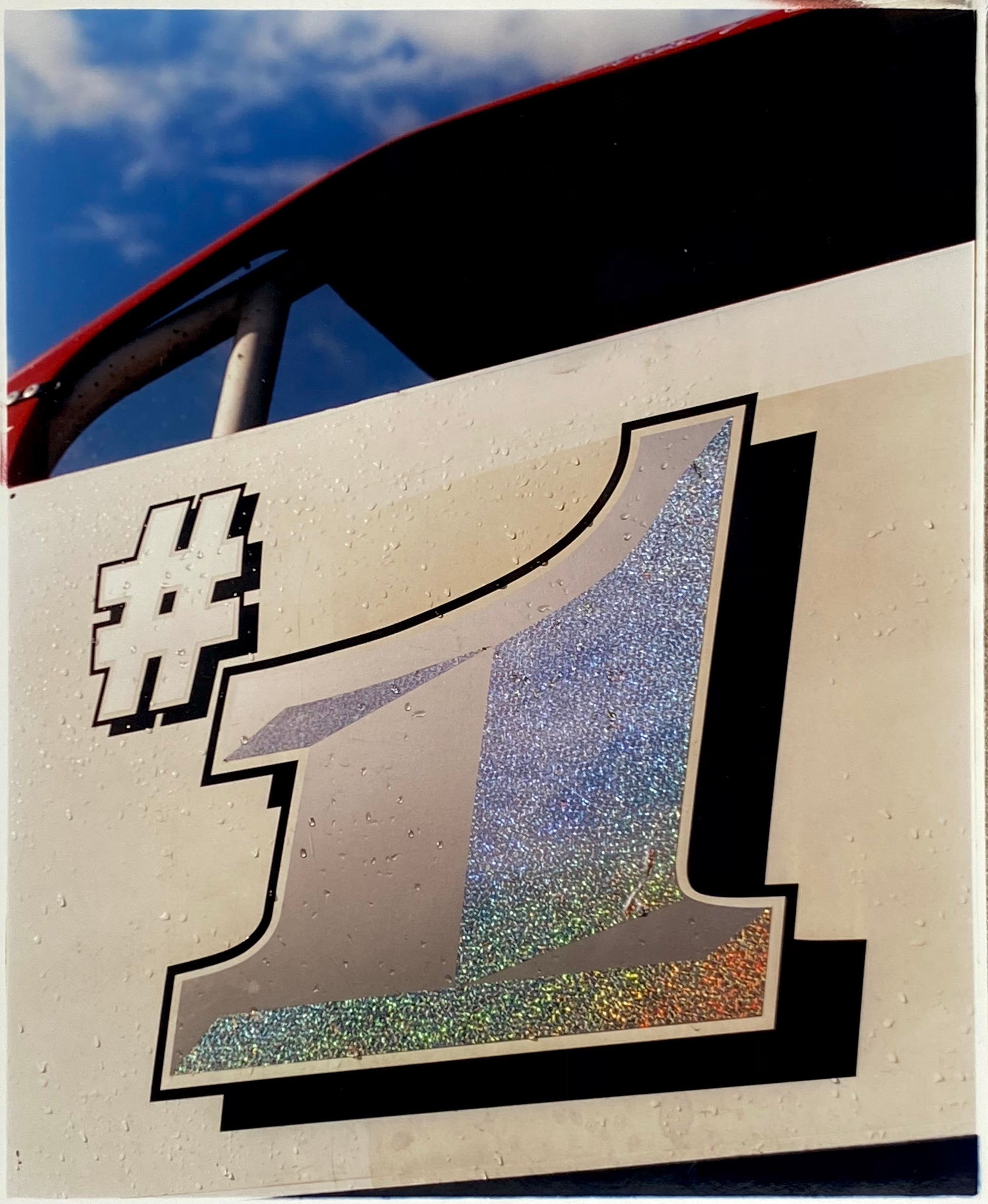 Number one on the side of a race car.