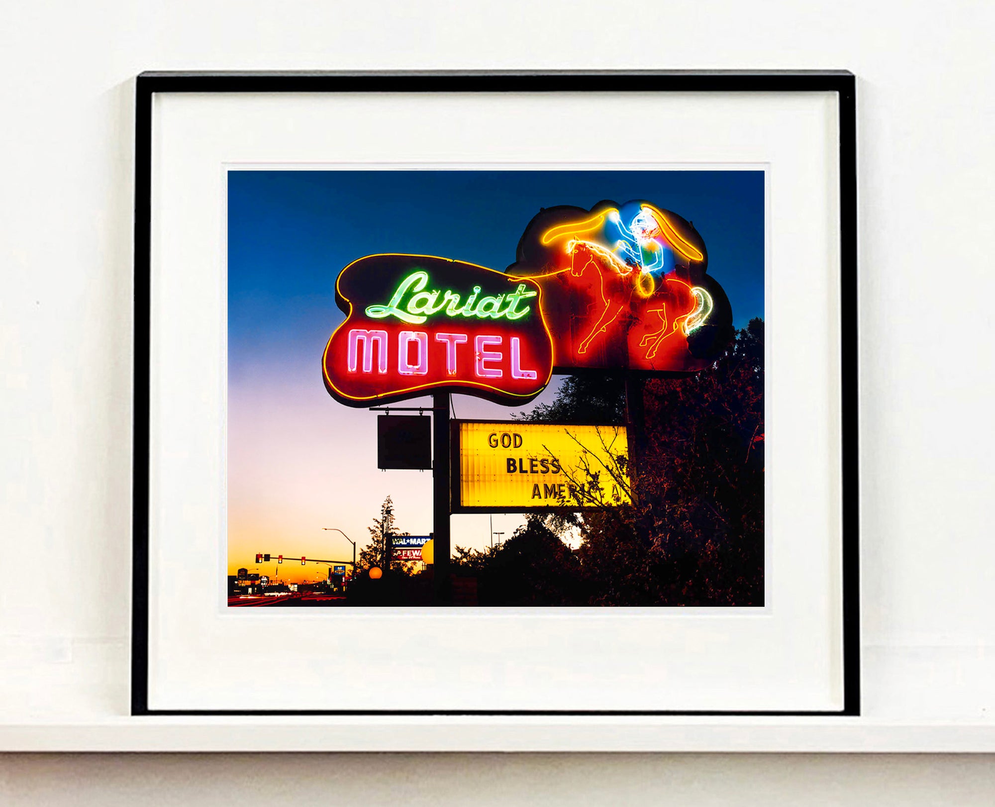 'Lariat Motel' is a classic Richard Heeps Americana 'Sign Porn' artwork. It was in it's captured original site in Fallon, Nevada. The owners since sold the Lariat Motel and donated the 1950's sign with original neon tubing to the Churchill Arts Council. This photograph forms part of Richard Heeps' 'Dream in Colour' series.
