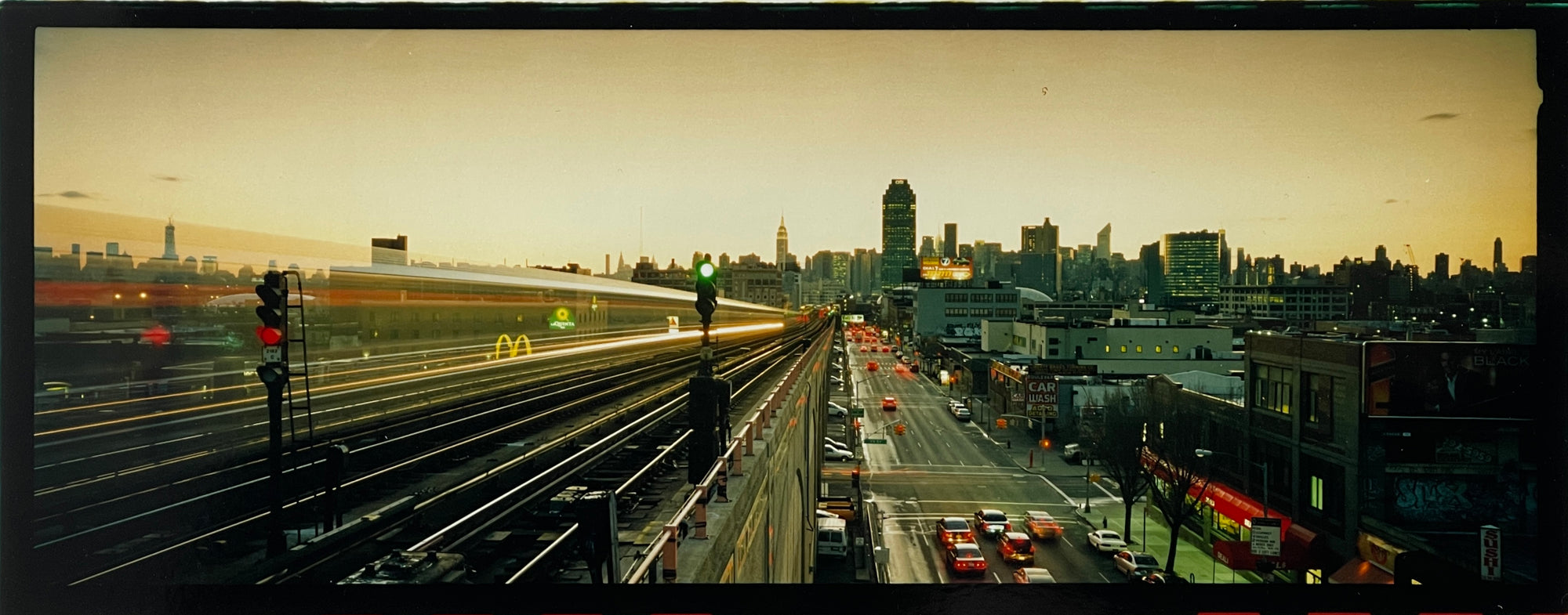 Panorama photograph taken at sunset from the New York 7 Line looking towards the Manhattan skyline.