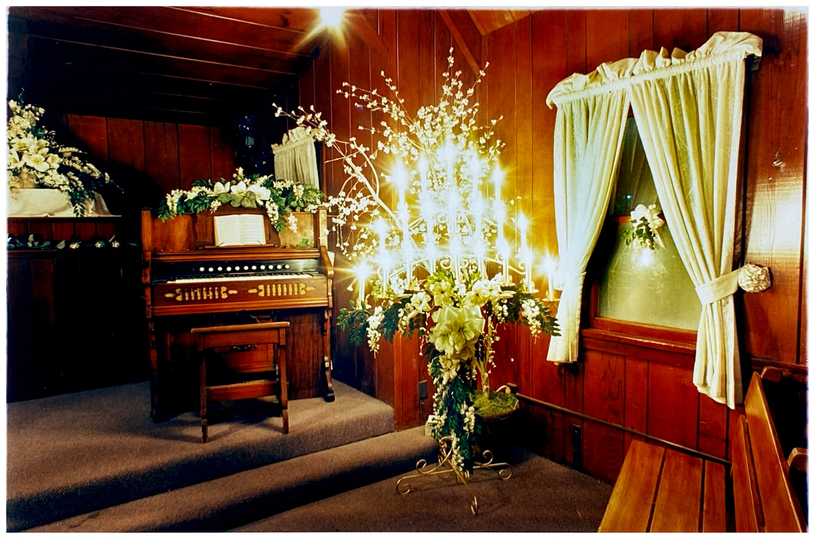 This piece shows the interior of the iconic Little Chapel of the West, where Elvis married in Viva Las Vegas. It is the oldest building on the Las Vegas Strip, and in the past sixty years has hosted many (in some cases short lived) celebrity weddings.