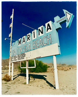 This classic beach style American Sign in the Salton Sea area of California features handwritten typography, bold against the beautifully weathered wood.