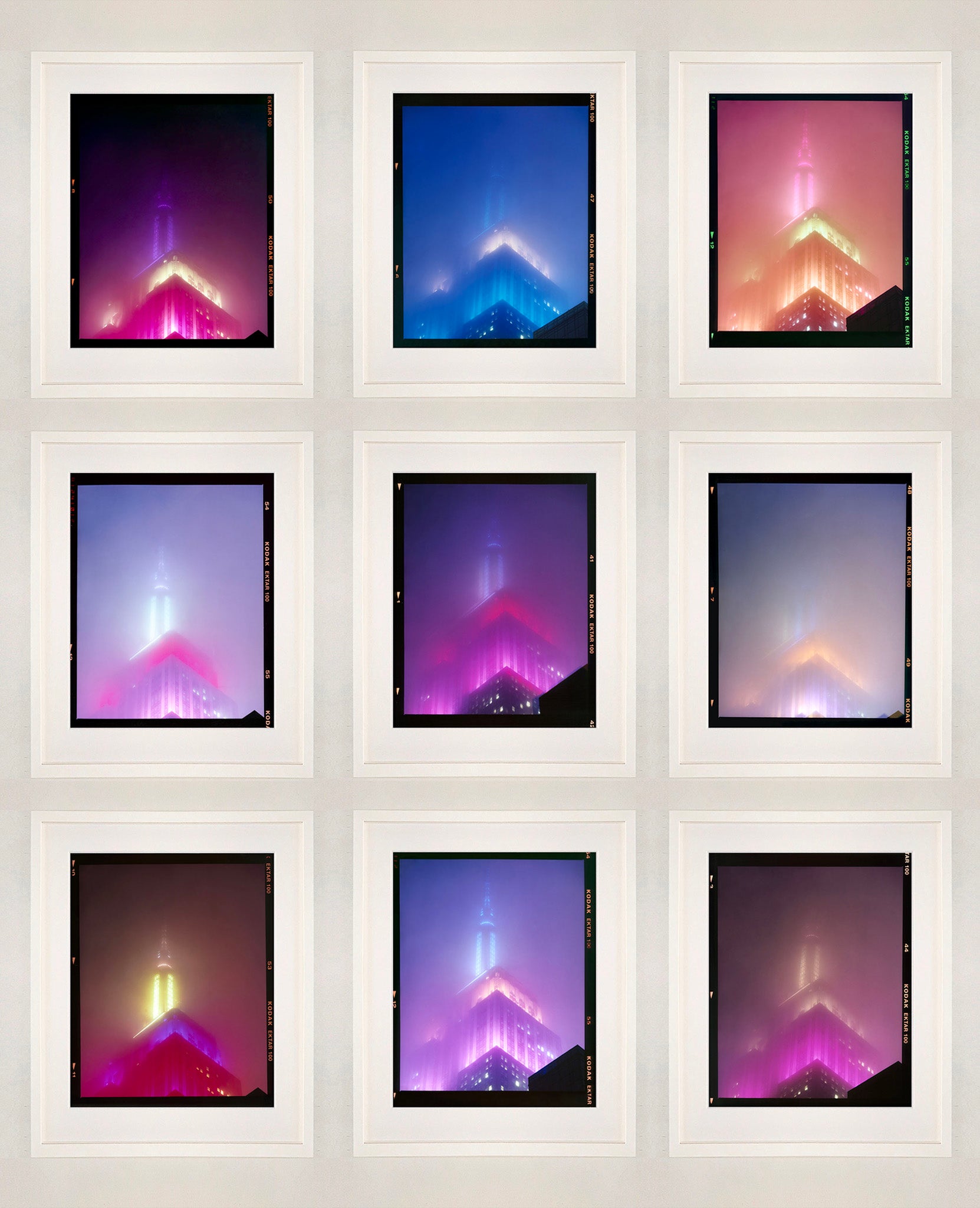 'NOMAD IX (Film Rebate)', New York. Richard Heeps has photographed the iconic Empire State building in the mist. The NOMAD sequence of photographs capture the art deco architecture illuminated by changing colours, and is part of Richard's street photography portfolio which depict the colour, fabric and structure of cities with distinct style. This 6x7 format edition is bordered by the Kodak film rebate. 