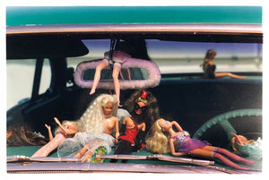 'Oldsmobile & Sinful Barbie's' photographed in, Las Vegas, Nevada, is part of Richard Heeps 'Man's Ruin' Series. This artwork makes up the three piece sequence: 'Wendy Flamin' Eyeball', 'Wendy Resting' & 'Oldsmobile and Sinful Barbie's' shot at the Rockabilly Weekender, Viva Las Vegas. Here this is a brilliantly adult version of the iconic Barbie Doll on the dashboard of a classic American Car. 