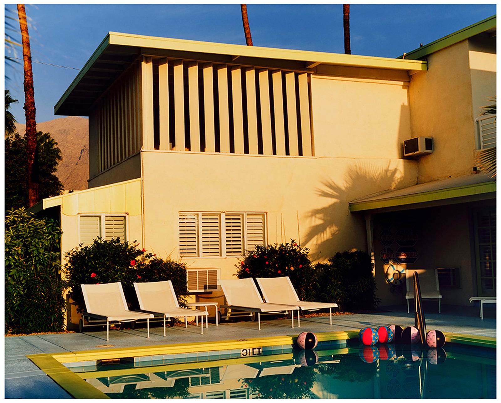 Photograph by Richard Heeps. Palm Springs Poolside, classic mid-century Palm Springs architecture, featuring cool blue skies and pool.
