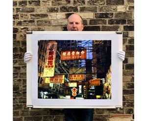 Best Choice in Downtown, captured by Richard Heeps in Kowloon in 2016, this piece perfectly captures the layers of Hong Kong. As a photographer Richard is always looking at what truly represents a place and when you think of Hong Kong the streets and overcrowded signs come to mind. The signs are no longer allowed to be added to so in time this effect will become something of the past.