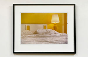 'Room' photographed by Richard Heeps at the mid-century Ballantines Move Colony in Palm Springs, California, shows a bright and bold yellow bedroom. This interior artwork is part of his 'Dream in Colour' series. 