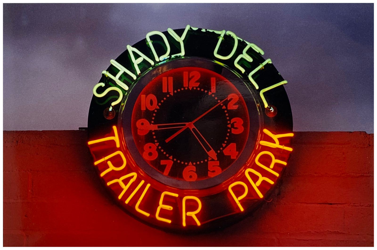 A neon sign belonging to Shady Dell Trailer Park in Bisbee, Arizona, which provides trailer and camping spaces to weary travellers along the famous Highway 80, which stretches from Savannah, Georgia to San Diego, California. This piece is part of Richard Heeps' 'Dream in Colour' series. 