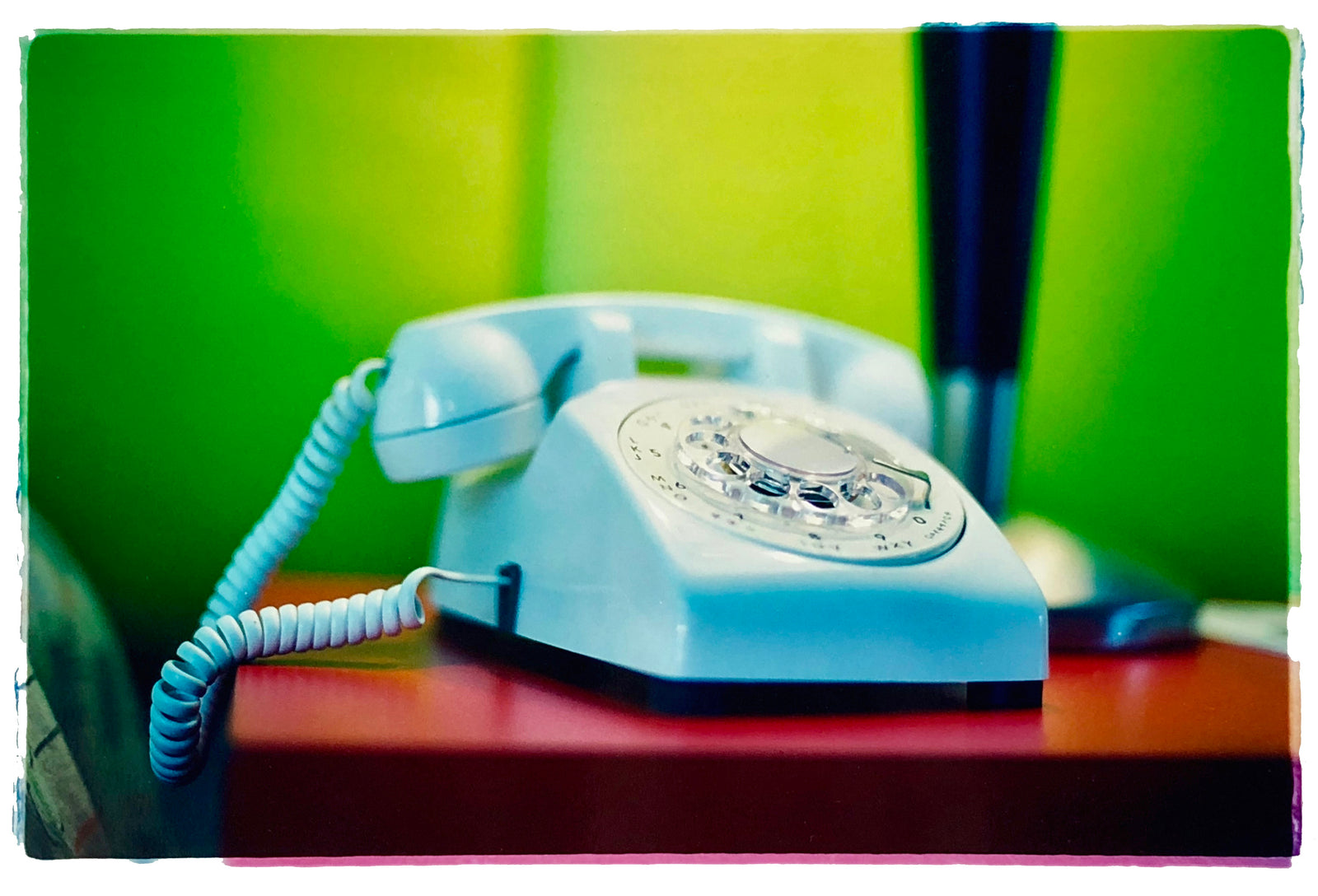 'Telephone III, Ballantines Movie Colony' is part of Richard Heeps' 'Dream in Colour' series. This cool Palm Springs interior artwork features a vintage telephone on a nightstand, combining gorgeous colours with a nostalgic mid-century feel.