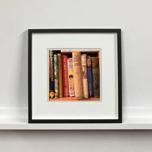 'Water Babies' shows the well worn spines of vintage children's books on a shelf, photographed by Richard Heeps in a secondhand bookshop in the British Seaside town Sheringham.