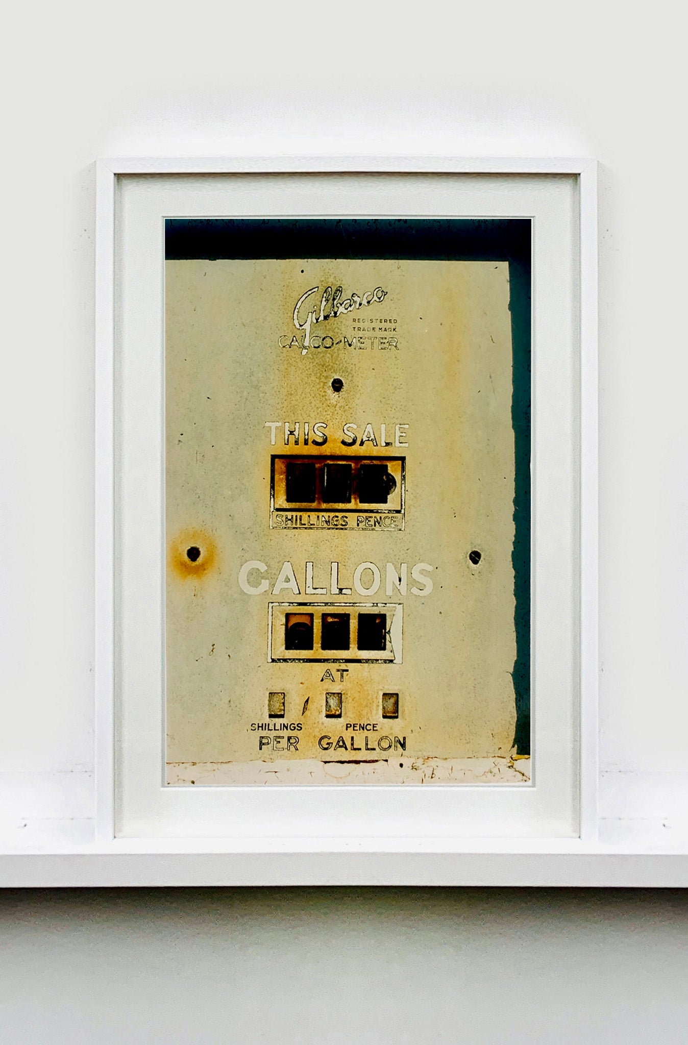 'This Sale' features a vintage petrol pump, something that Richard likes to collect, captured in a Fenland village in the rural area near Richard's home in Cambridge. This artwork is part of his autobiographical series, 'A View of the Fens from the Car with Wings'.
