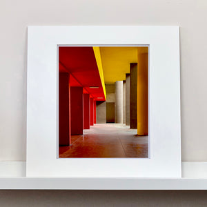 Monte Amiata housing, Gallaratese Quarter, Milan. Mounted red and yellow brutalist architecture photograph by Richard Heeps.