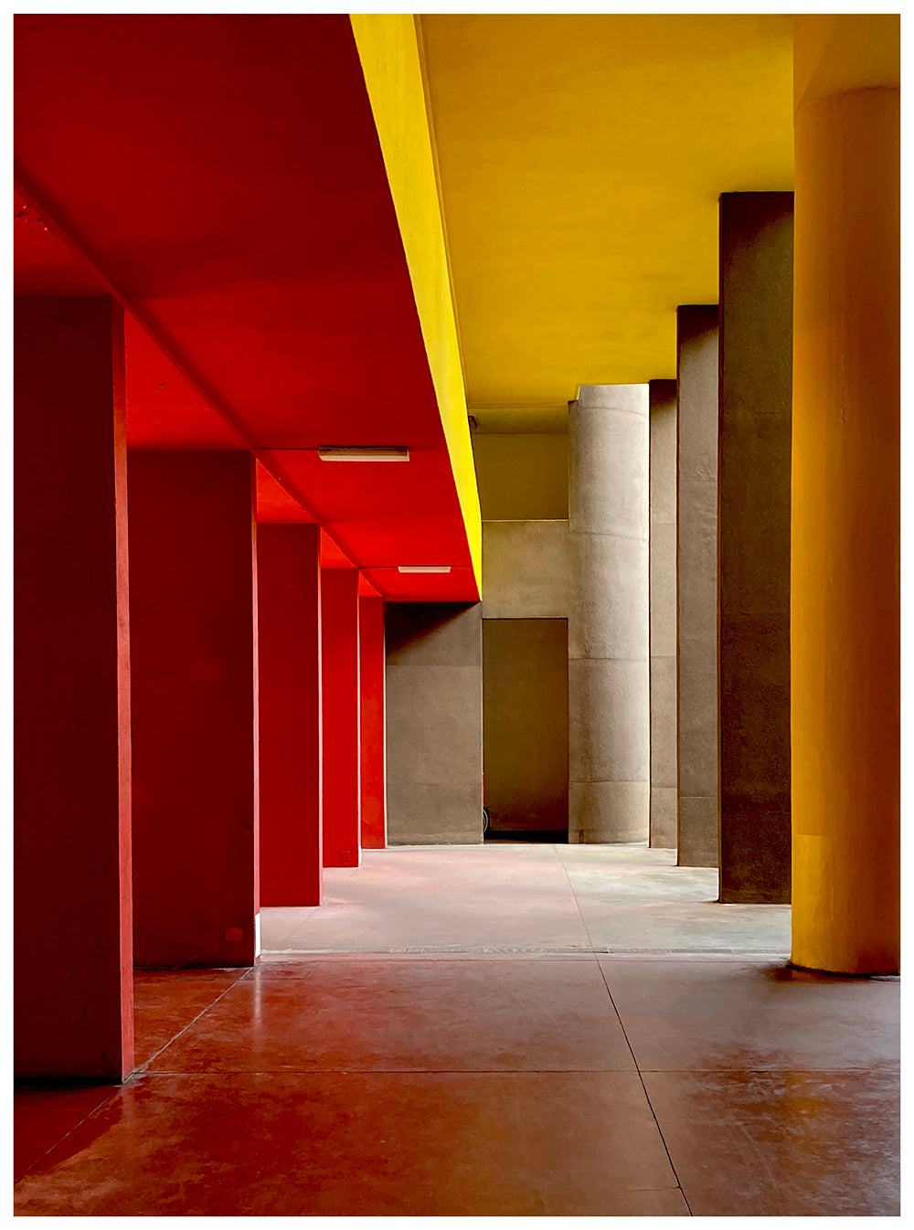 Monte Amiata housing, Gallaratese Quarter, Milan. Red and yellow brutalist architecture photograph by Richard Heeps.