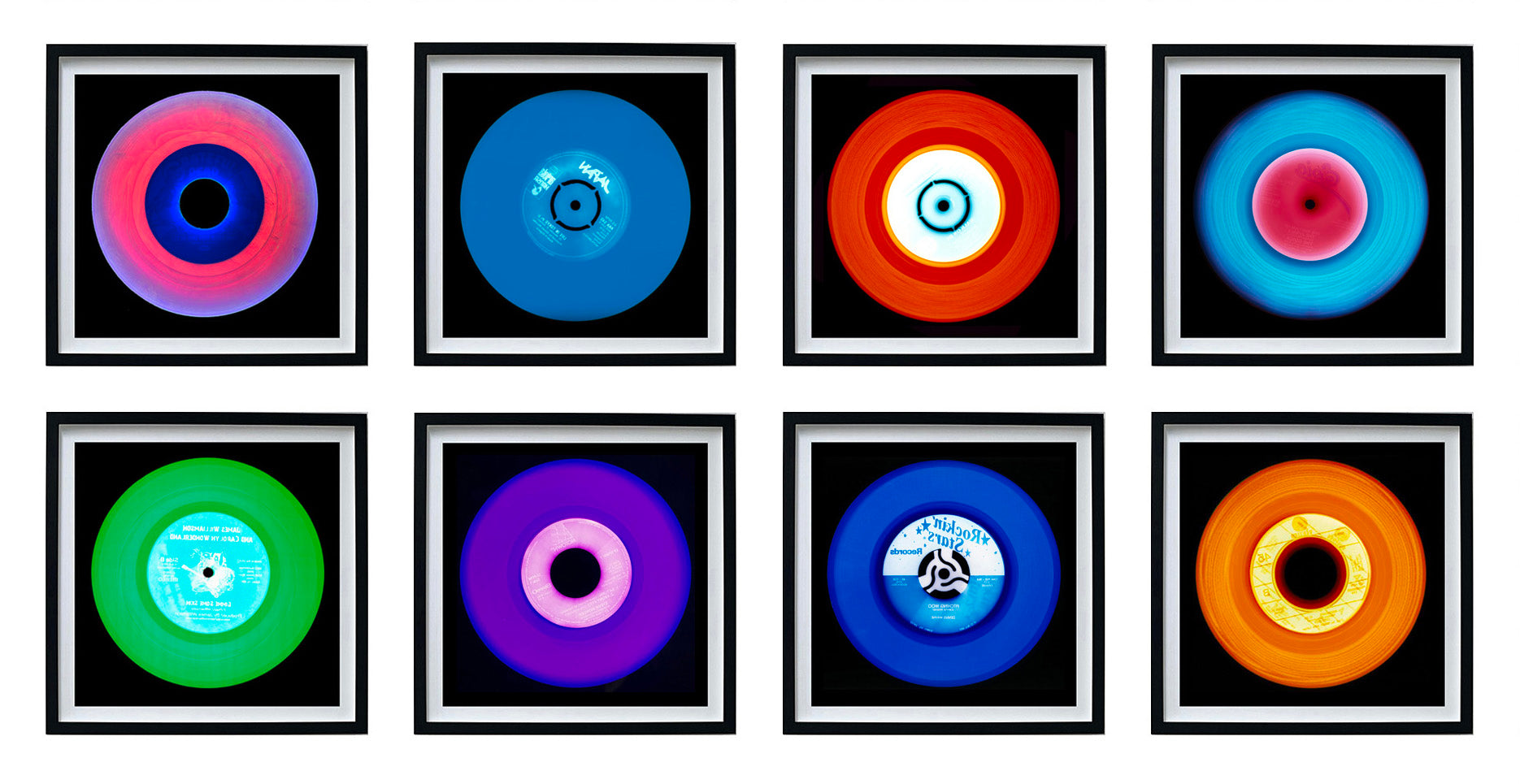 Photographs by Heidler and Heeps. A set of 8 (2 rows of 4) Vinyls in striking colours, with black frames. 