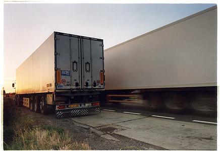 A set of photographs that followed a straight line. The images would go through, over and under what ever came in the path of the camera’s lens: truck, lorry, heavy goods vehicle.
